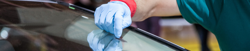 checking auto glass repair